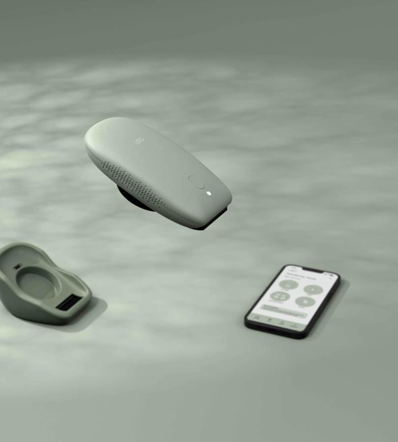 Loci scanner with its indicator light, beside the Loci app